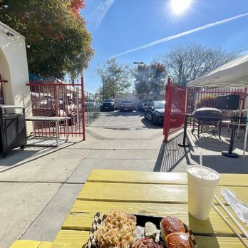 MEGA Texas Barbeque - Outdoor seating where the offset smokers and Weber Ranch kettles are set up. - Caterers Near Me - Fresno, California MEGA Texas Barbeque - Outdoor seating where the offset smokers and Weber Ranch kettles are set up. - Caterers Near Me - Fresno, California