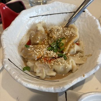 Dumpling Story - Pork dumplings with sesame - Asian Fusion Near Me - San Francisco, California Dumpling Story - Pork dumplings with sesame - Asian Fusion Near Me - San Francisco, California