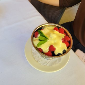 The Capital Grille - Cheesecake with berries and creme brulee sauce - Steakhouses Near Me - Austin, Texas The Capital Grille - Cheesecake with berries and creme brulee sauce - Steakhouses Near Me - Austin, Texas