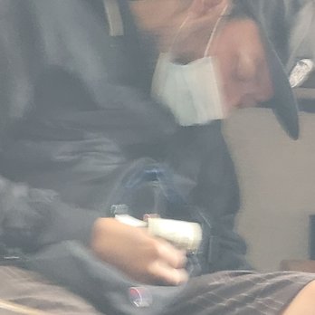 Starbucks - Homeless asleep at Starbucks - Coffee & Tea Near Me - Orange, California