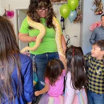 Kids Reptile Parties - Burmese Python! This was such an awesome treat! I actually got to hold this baby (not me pictured)! But the kids just pet it. - Party & Event Planning Near Me Kids Reptile Parties - Burmese Python! This was such an awesome treat! I actually got to hold this baby (not me pictured)! But the kids just pet it. - Party & Event Planning Near Me