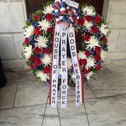House of Prayer Christian Church - This is a wreath that the churches Honor Guard laid at the tomb of the unknown soldier at Arlington Cememtery in Washington DC