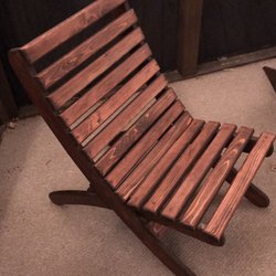 Collapsible chair. This is made with 2 separate pieces. Easy to put together.
