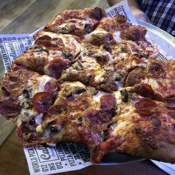 Caliente Pizza and Draft House - 9 cut three toppings burnt - Pizza Near Me - Monroeville, Pennsylvania Caliente Pizza and Draft House - 9 cut three toppings burnt - Pizza Near Me - Monroeville, Pennsylvania