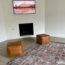 Tech Support Austin - Samsung Frame TV mounted on concrete fireplace