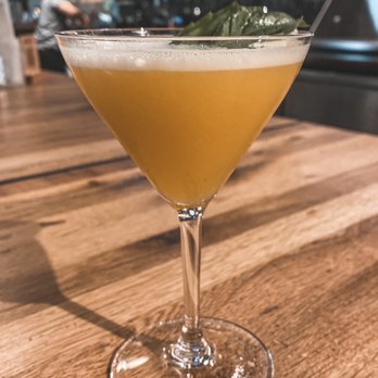 Moku Kitchen - No Ka Oi: Ocean vodka, Lilikoi, Thai basil, honey, lime, egg white - Cocktail Bars Near Me - Honolulu, Hawaii Moku Kitchen - No Ka Oi: Ocean vodka, Lilikoi, Thai basil, honey, lime, egg white - Cocktail Bars Near Me - Honolulu, Hawaii
