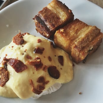 Cava Mezze - Olney - Crispy pork belly with poached egg hollandaise sauce and bacon bits! - Mediterranean Near Me - Olney, Maryland Cava Mezze - Olney - Crispy pork belly with poached egg hollandaise sauce and bacon bits! - Mediterranean Near Me - Olney, Maryland