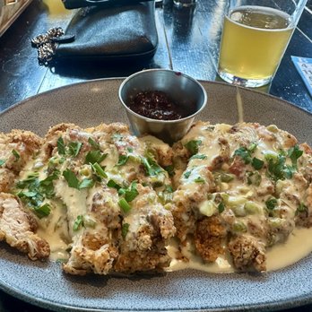 Flying Saucer Draught Emporium - Brunch fried chicken biscuit & jalapeño gravy. - Beer Bar Near Me - Dallas, Texas Flying Saucer Draught Emporium - Brunch fried chicken biscuit & jalapeño gravy. - Beer Bar Near Me - Dallas, Texas