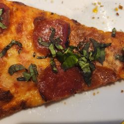 Bert’s Pizzaria - Pepperoni slice (we added the basil!)