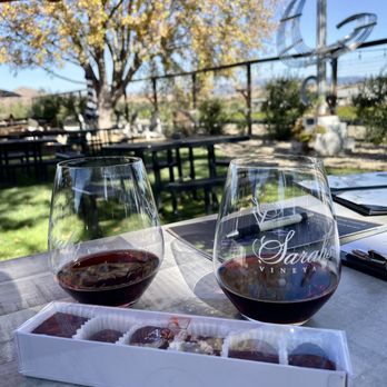 Sarah's Vineyard - two glasses of wine and a box of chocolates - Wine Tasting Room Near Me - Gilroy, California Sarah's Vineyard - two glasses of wine and a box of chocolates - Wine Tasting Room Near Me - Gilroy, California