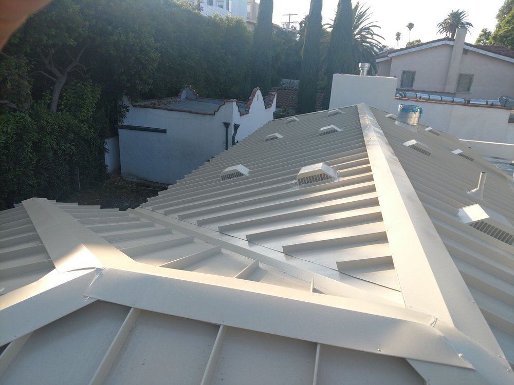 Slide of Golden Winter Roofing