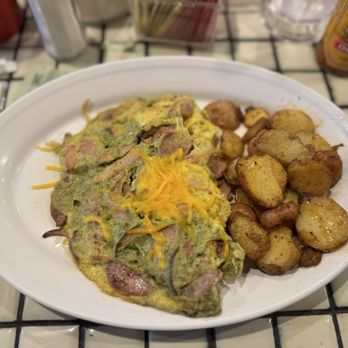 Montclair Egg Shop - Build your own Omelette: four items - Pesto, cheddar, apple chicken sausage and ham. - Breakfast & Brunch Near Me - Oakland, California