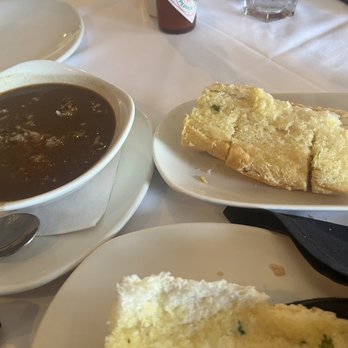 Landry's Seafood House - This is chicken sausage gumbo along with complimentary toasted garlic bread. - Seafood Near Me - Katy, Texas Landry's Seafood House - This is chicken sausage gumbo along with complimentary toasted garlic bread. - Seafood Near Me - Katy, Texas