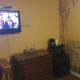 Ugly dark room with a crappy TV. Ugly dark room with a crappy TV.