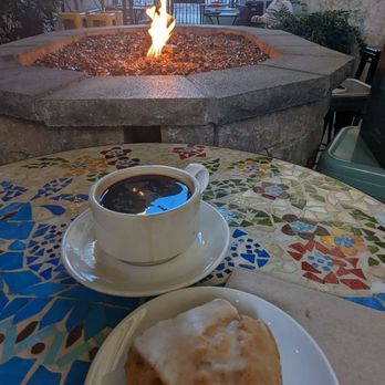 Hostel Cafe - Hostel courtyard firepit. Add'l umbrella heaters barista gladly offered on a cooling down PM ;) And another sidewalk patio out front not pic - Breakfast & Brunch Near Me - Portland, Oregon