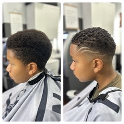 Justin's Fades & Hairstyles - Medium skin fade with a basic hair design