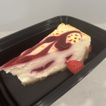 Rick's On Main - White chocolate raspberry cheesecake - New American Near Me - East Aurora, New York Rick's On Main - White chocolate raspberry cheesecake - New American Near Me - East Aurora, New York