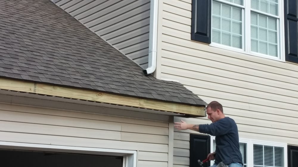 Slide of Accurate Roofing Pros