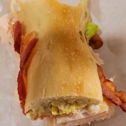 Monkey's Subs - Turkey bacon avocado minus a couple bites ( oops). Extra good bacon this time.