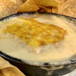 Red Dog On Main - Beer Cheese dip with tortilla chips.
