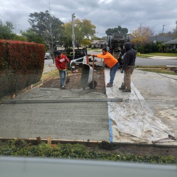 Roman Concrete - To ensure the condition of our existing driveway, they used wheel barrels to bring the new concrete up to pour... - Masonry/Concrete Near Me - Anaheim, California Roman Concrete - To ensure the condition of our existing driveway, they used wheel barrels to bring the new concrete up to pour... - Masonry/Concrete Near Me - Anaheim, California
