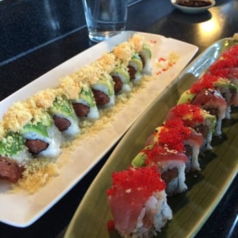 Ahi Sushi Bar - On the left: my clementine without cream cheese add tempura bits. On the right: firecracker with ahi - Sushi Bars Near Me - Eagle, Idaho Ahi Sushi Bar - On the left: my clementine without cream cheese add tempura bits. On the right: firecracker with ahi - Sushi Bars Near Me - Eagle, Idaho