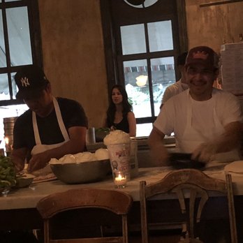 Lucali - Yep, they use wine bottles to roll out the dough. - Pizza Near Me - Brooklyn, New York Lucali - Yep, they use wine bottles to roll out the dough. - Pizza Near Me - Brooklyn, New York