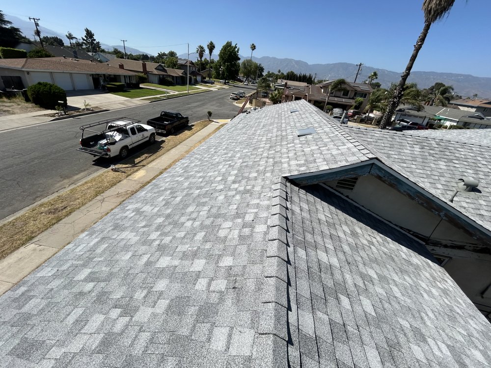 Slide of EZ Roof Repairs