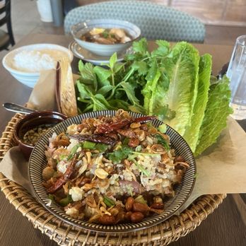 Pha Khao Lao Cuisine - Nam Khao lettuce wraps , gorgeous and delicious, vibrant array of flavors and textures. - Laotian Near Me - San Diego, California Pha Khao Lao Cuisine - Nam Khao lettuce wraps , gorgeous and delicious, vibrant array of flavors and textures. - Laotian Near Me - San Diego, California
