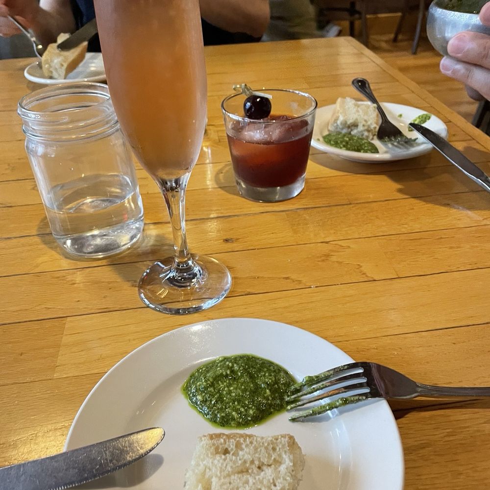 Mona Lisa's - Bread with side of pesto - Italian Near Me - Eau Claire, Wisconsin Mona Lisa's - Bread with side of pesto - Italian Near Me - Eau Claire, Wisconsin