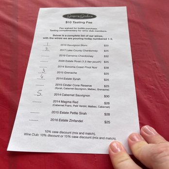 Gregory Graham Wines - a hand holding a wine list - Wineries Near Me - Lower Lake, California Gregory Graham Wines - a hand holding a wine list - Wineries Near Me - Lower Lake, California