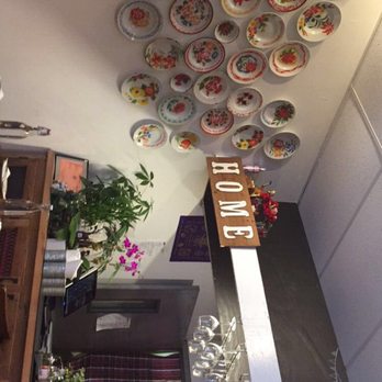 Hug Esan - The things on the wall are actually used as serving trays in our culture lol but cute decor nonetheless. - Thai Near Me - Elmhurst, New York Hug Esan - The things on the wall are actually used as serving trays in our culture lol but cute decor nonetheless. - Thai Near Me - Elmhurst, New York