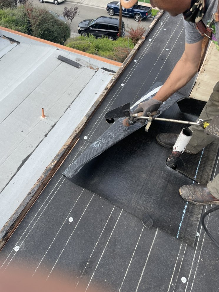 Slide of Figueroa’s Roofing