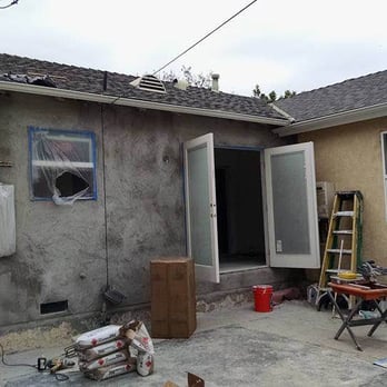 Four Seasons Builders - 6. New stucco around new door and new window. Our dining room is where the French doors are, that used to be the kitchen! - General Contractors Near Me - Burbank, California