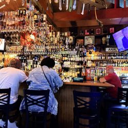 The upstairs bar with dozens of upsidedown bottles of "top shelve" pun intended