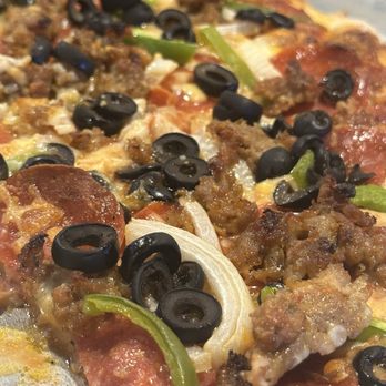 Little Ray's Pizzeria - Monster Pizza with Black Olives instead of Mushrooms. It comes with Crumbled flavorful Italian sausage. - Pizza Near Me - Glendale, Arizona Little Ray's Pizzeria - Monster Pizza with Black Olives instead of Mushrooms. It comes with Crumbled flavorful Italian sausage. - Pizza Near Me - Glendale, Arizona
