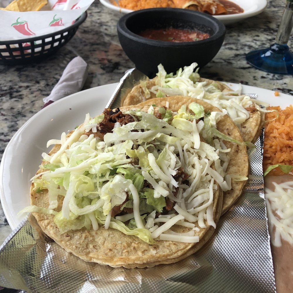 Taco Jalisco - 3 carnitas tacos on corn tortillas with rice and beans. 1 chicken and 1 beef enchilada with rice and beans. - Mexican Near Me - Grand Haven, Michigan Taco Jalisco - 3 carnitas tacos on corn tortillas with rice and beans. 1 chicken and 1 beef enchilada with rice and beans. - Mexican Near Me - Grand Haven, Michigan