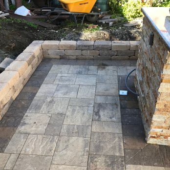 System Pavers - A picture showing the small retaining wall that was built to hold back the dirt. Notice Dark outline pavers that contrast the lighter stone - Masonry/Concrete Near Me - Fremont, California System Pavers - A picture showing the small retaining wall that was built to hold back the dirt. Notice Dark outline pavers that contrast the lighter stone - Masonry/Concrete Near Me - Fremont, California