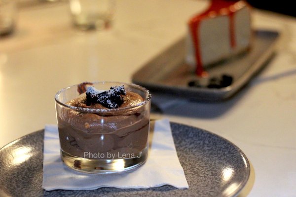 Photo of Sava's - Ann Arbor, MI, US. Chocolate Mascarpone Mousse ($13) - pomegranate reduction, brownie pieces