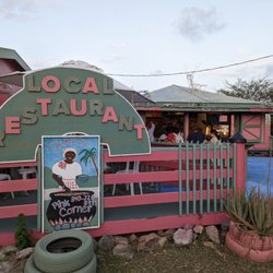 Ekaete Pink Corner - The front of this cozy restaurant that is welcoming and rich with local vibes