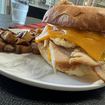 Northern D Lights - Breakfast sandwich with turkey instead of pork. RATING:5/5. Love toasted bun. Breakfast potatoes 4/5, not fresh, needs more seasoning. - Bakeries Near Me - Schertz, Texas