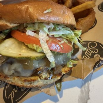 The Stand - American Classics Redefined - Stand burger with fries and onion rings. - New American Near Me - Valencia, California The Stand - American Classics Redefined - Stand burger with fries and onion rings. - New American Near Me - Valencia, California