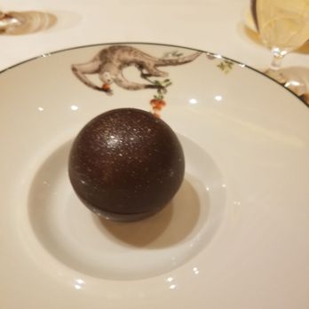 Le Cirque - The chocolate ball at plating - French Near Me - Las Vegas, Nevada Le Cirque - The chocolate ball at plating - French Near Me - Las Vegas, Nevada