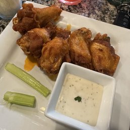 Mild wings extra crispy with ranch dressing and celery sticks. Mild wings extra crispy with ranch dressing and celery sticks.
