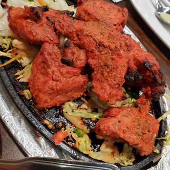 Royal Hyderabad - Chicken Tikka served over sizzling onions. Delicious! - Indian Near Me - Albuquerque, New Mexico