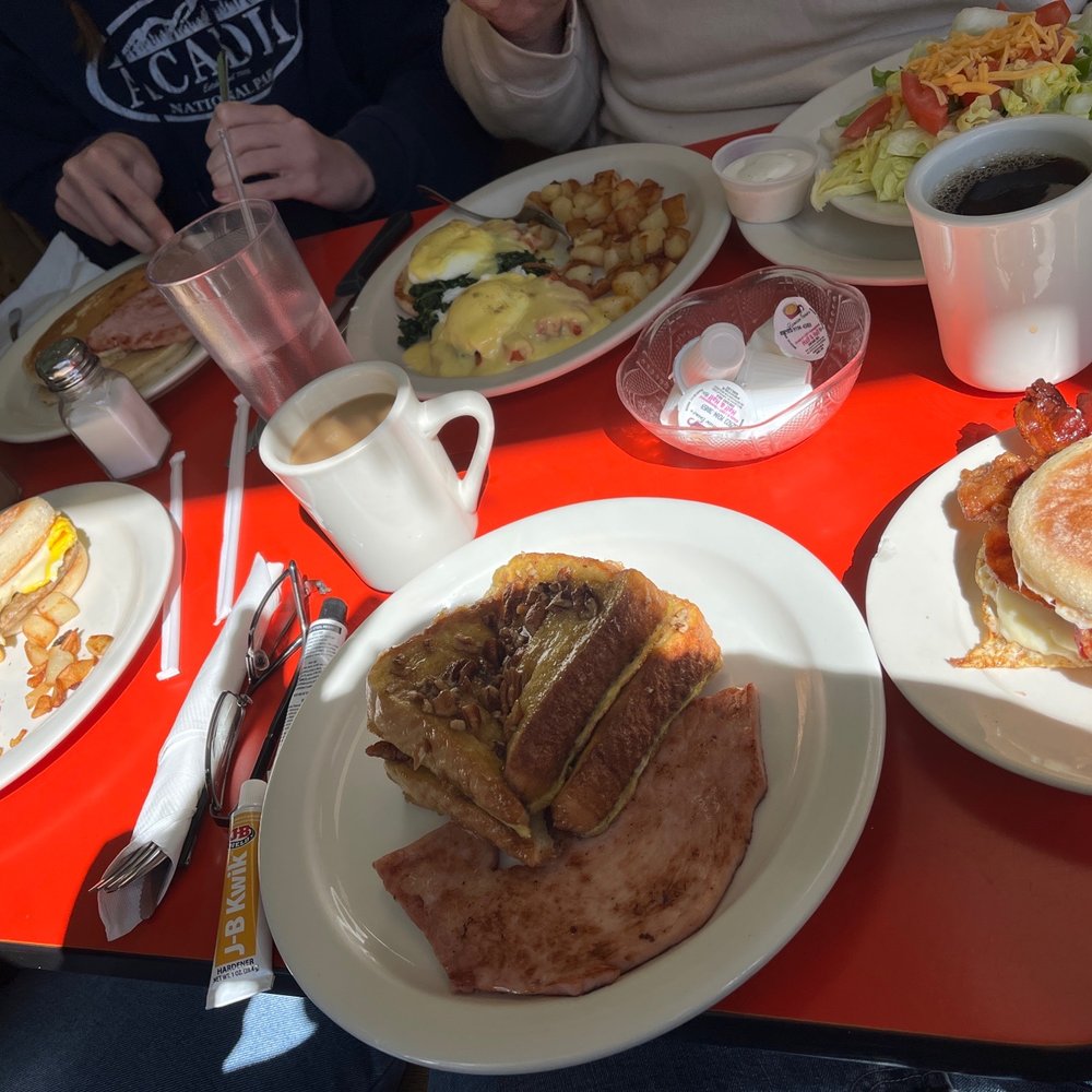Brickyard Cafe - a red table with plates of food and a cup of coffee - American Near Me - Farmington, Maine Brickyard Cafe - a red table with plates of food and a cup of coffee - American Near Me - Farmington, Maine