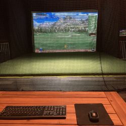 Sports Box - The net cage and the game is golf