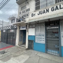 Dr. Juan Galván Machado - Entrance to his is the last door on the left and go up the stairs (yes, it's the one with the dental sign above the white door).