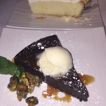 USS Nemo Restaurant - Flourless choc decadence and coconut cream pie - Asian Fusion Near Me - Naples, Florida USS Nemo Restaurant - Flourless choc decadence and coconut cream pie - Asian Fusion Near Me - Naples, Florida