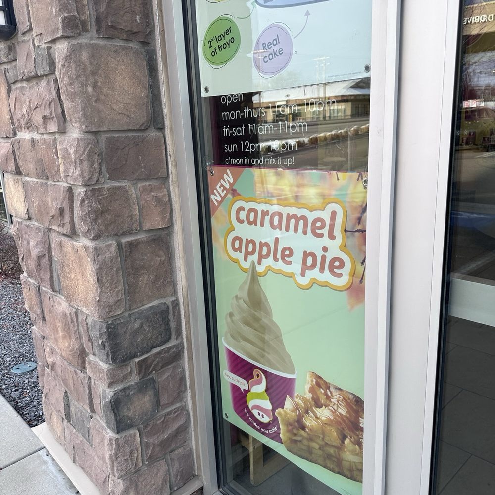 Menchie's - a sign in the window of a store - Gluten-Free Near Me - Draper, Utah